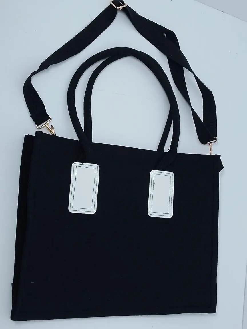 Black landscape canvas bag with carry handles and an adjustable shoulder strap with metal clips, Hensa