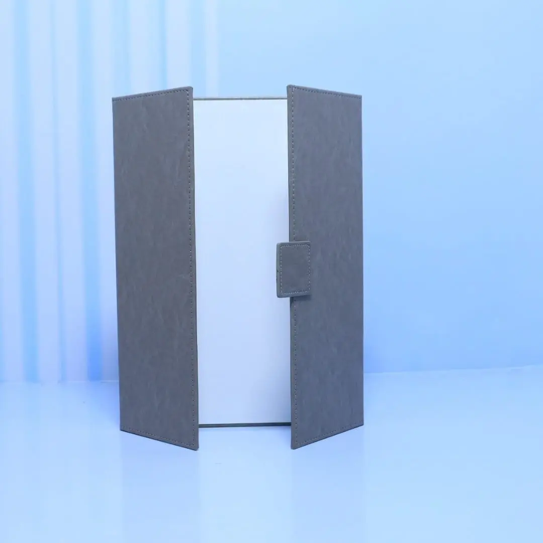 Grey tri-fold certificate holder standing open, Hensa