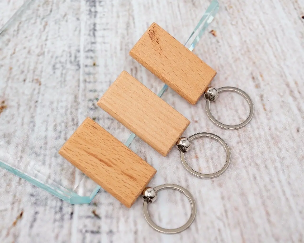 Three rectangular wooden keyholders, Hensa