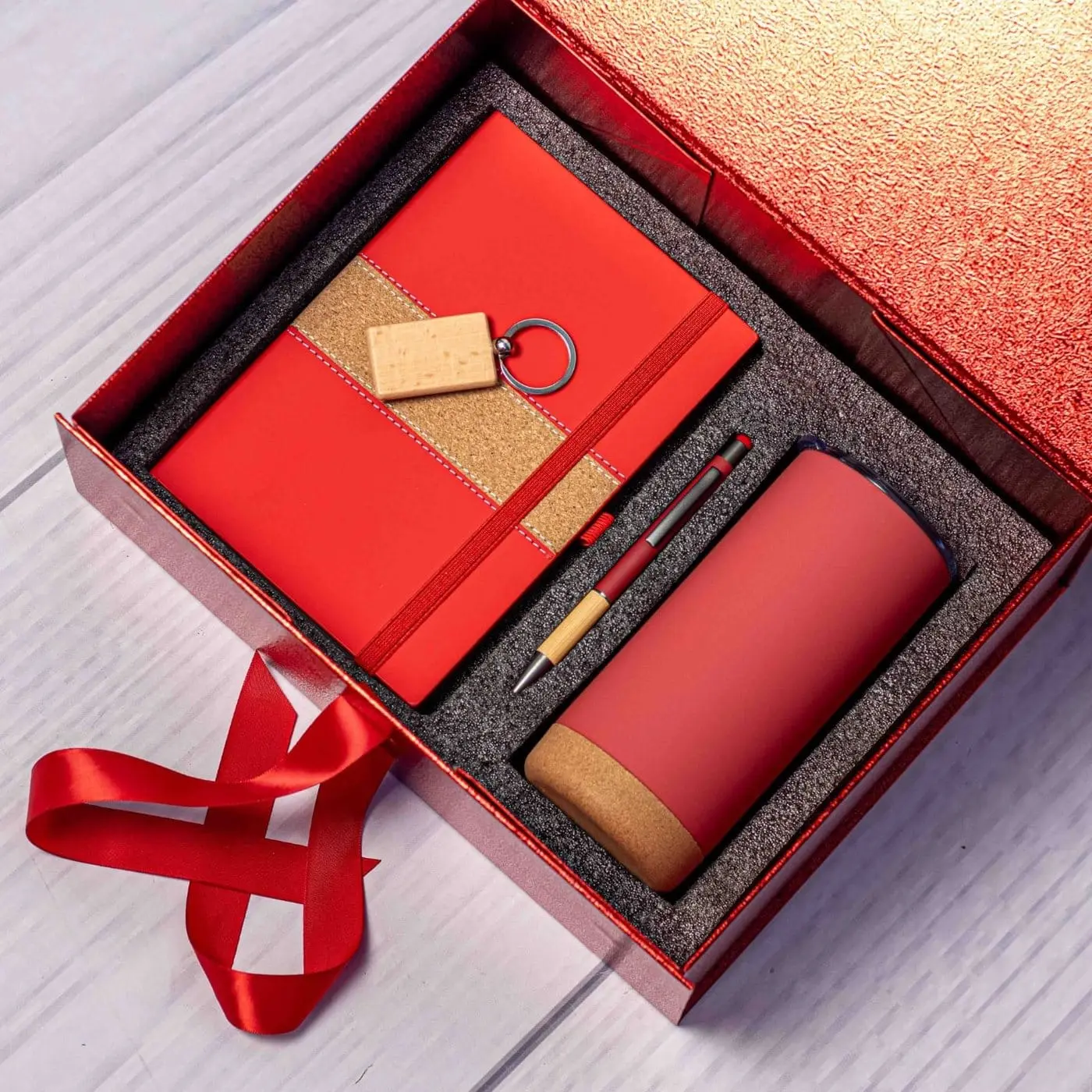Red notebook, cork-base tumbler, pen and wooden keyholder in a red gift box, Hensa