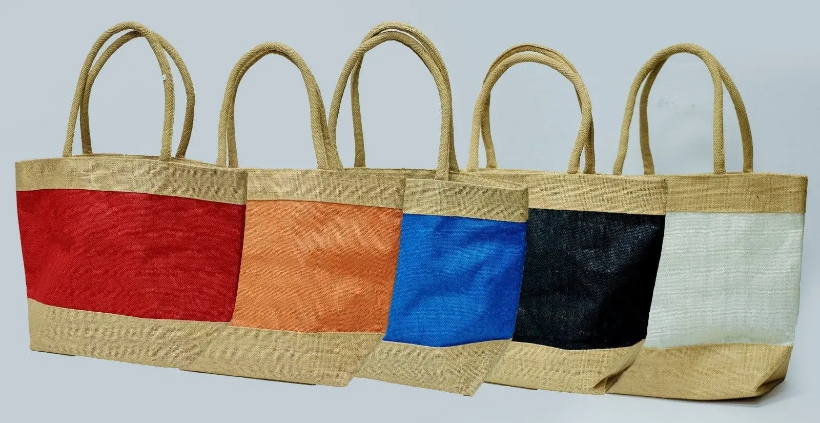 Five jute tote bags with natural bands and red, orange, blue, black and white middle panels, Hensa
