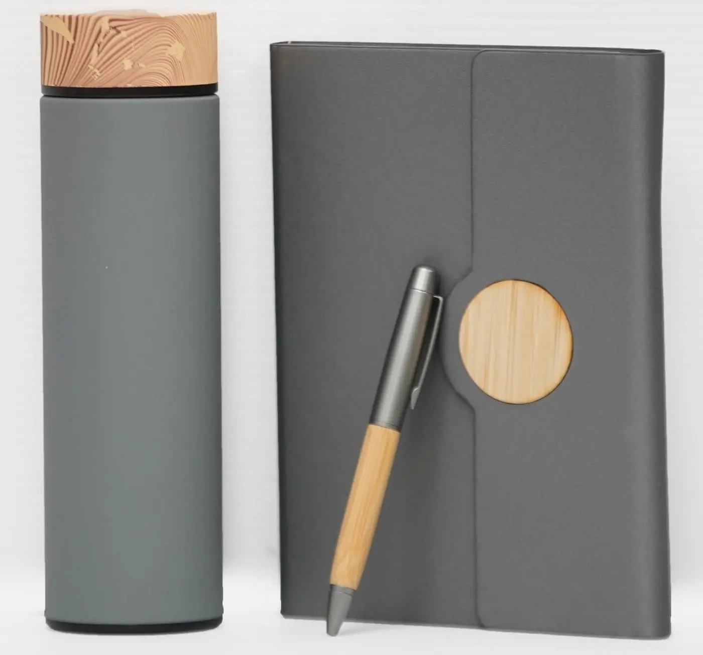 Grey notebook with bamboo clasp, flask with wooden lid and bamboo pen, Hensa