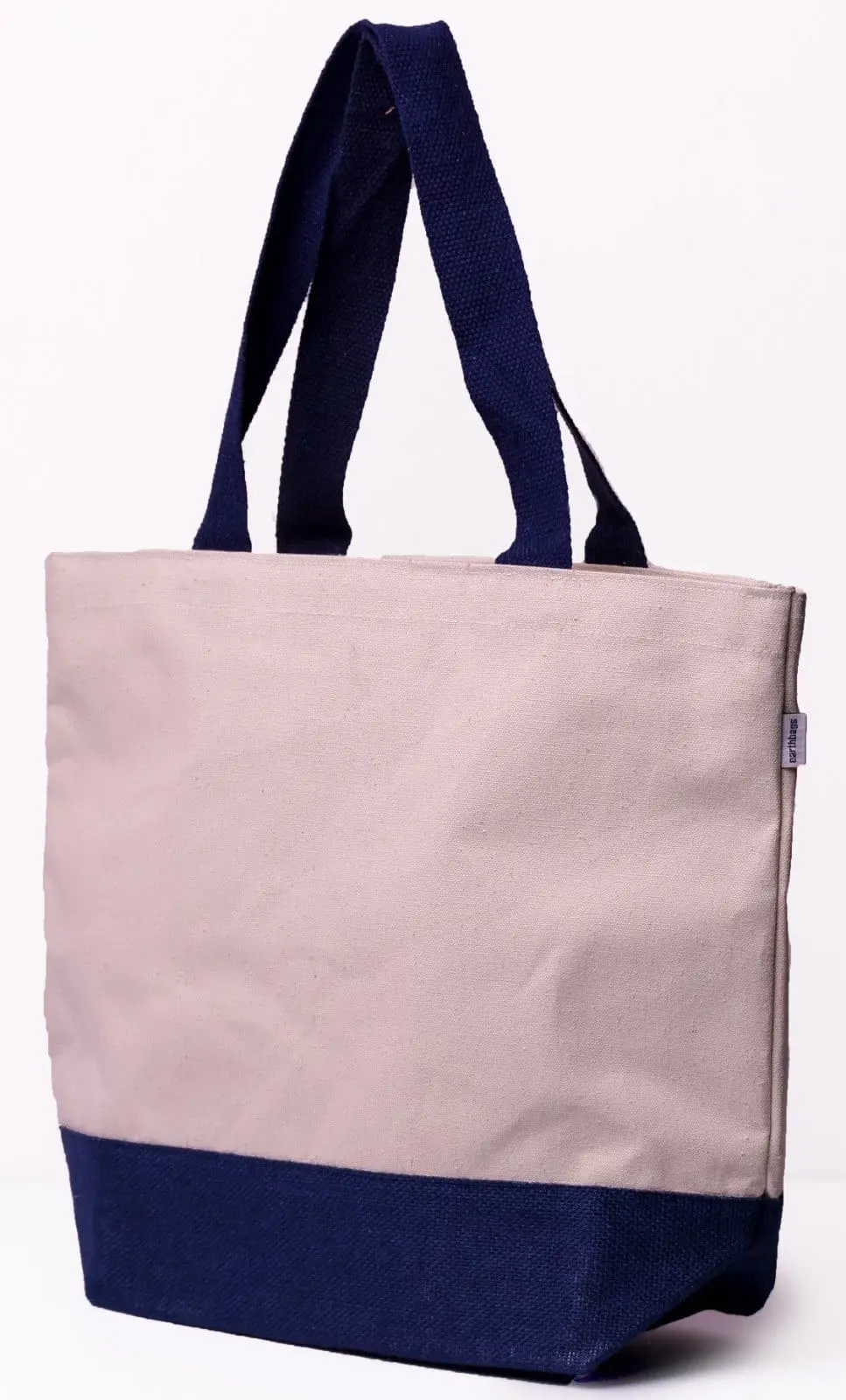Canvas bag with a navy base and navy handles beside a red version, Hensa