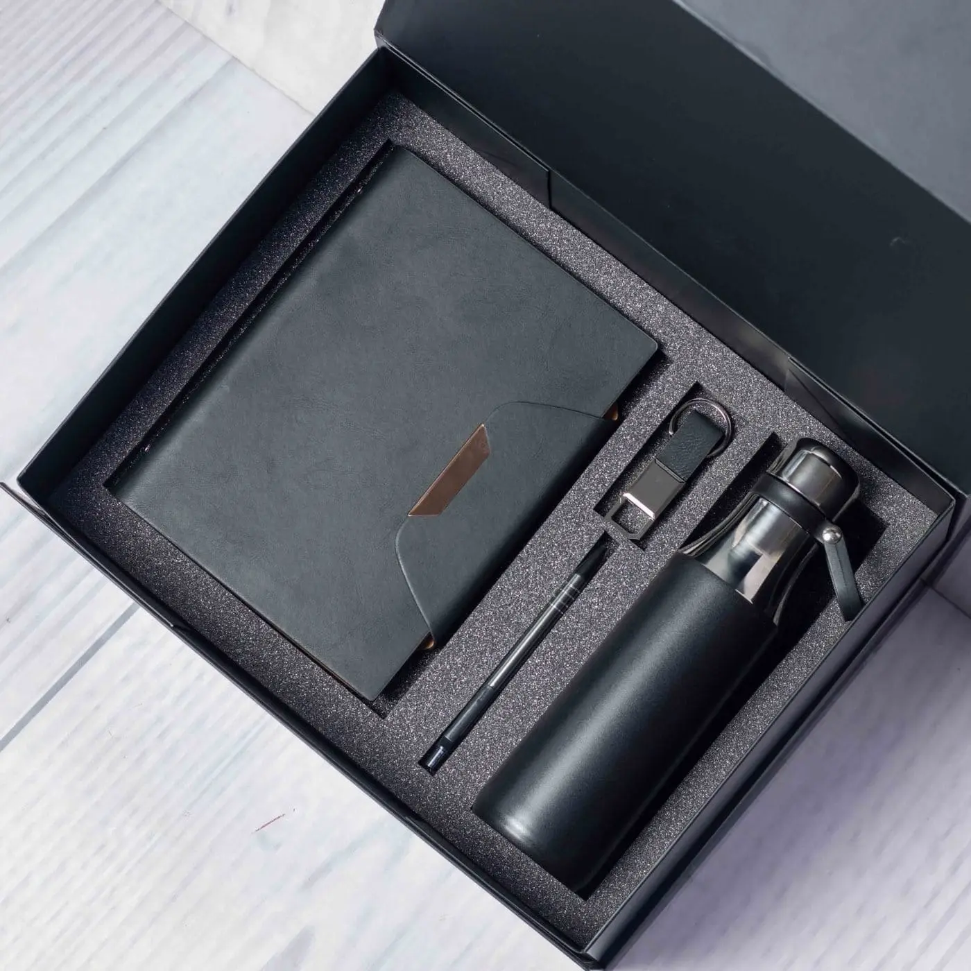 Black notebook with gold strip, flask and pen in a black gift box, Hensa