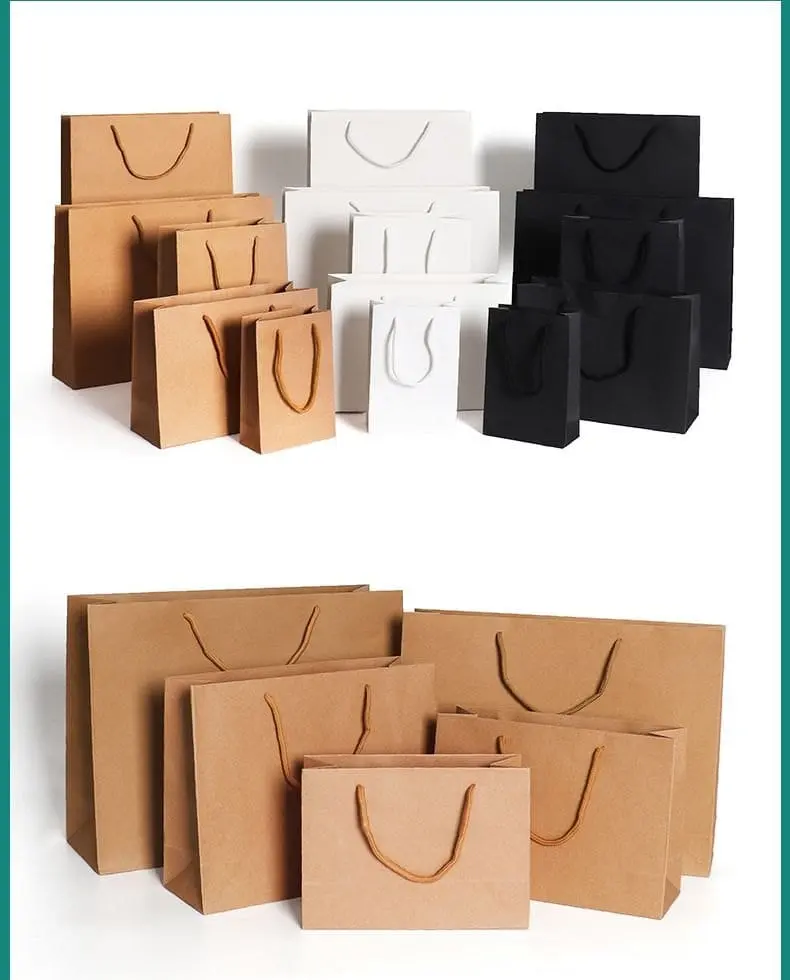 Stack of kraft brown, white and black paper gift bags in several sizes with rope handles, Hensa