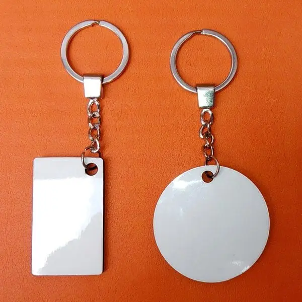 White glossy rectangle and round sublimation key holders on chain and split ring, Hensa