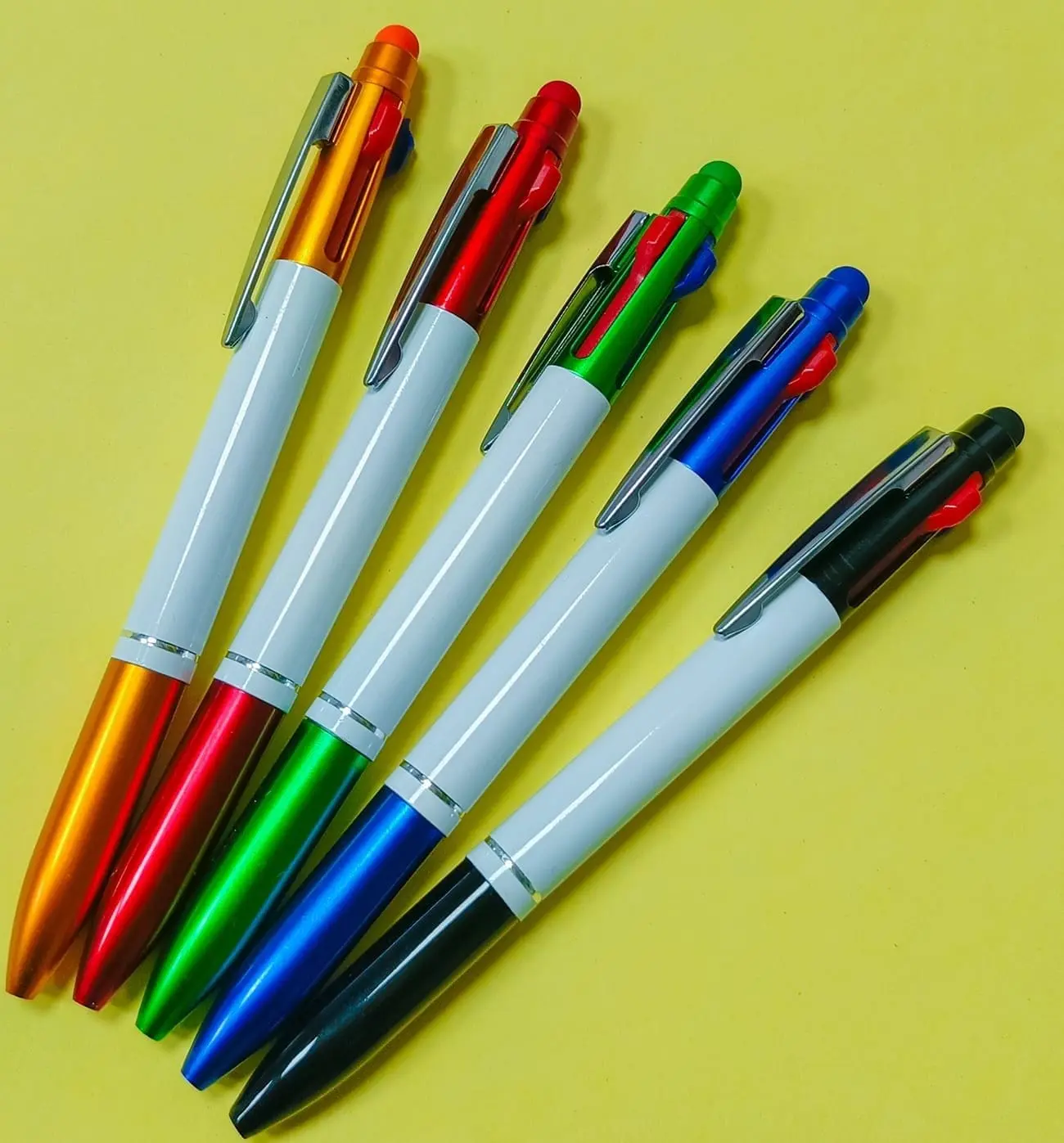 Plastic click pens with coloured metallic-look tops in a fan, Hensa