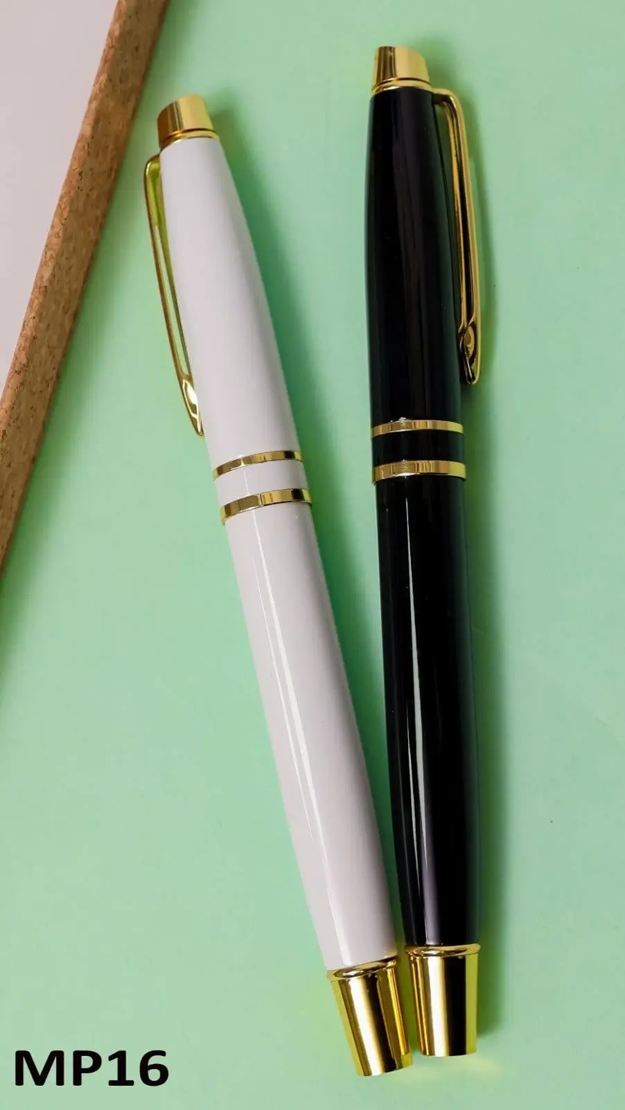 White and black metal pens with gold caps, clips, double rings and gold ends, Hensa