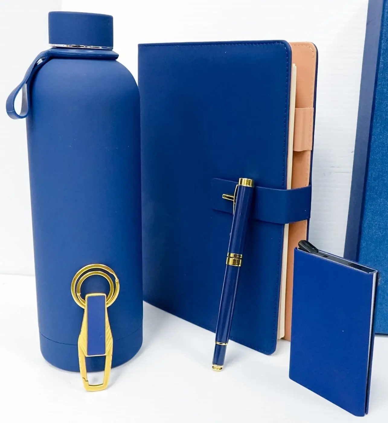 Blue notebook, water bottle, pen, keyholder and card holder in a blue gift box, Hensa